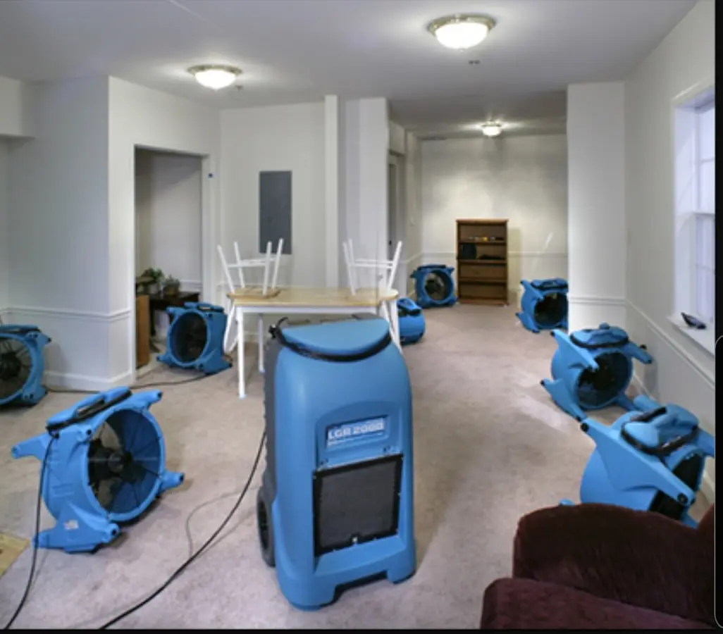 Air movers and dehumidifier setup for Water Damage Restoration in Overland